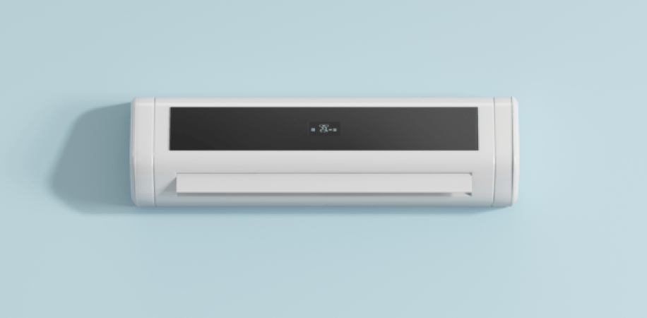 airco binnenunit aan lichtblauwe muur 